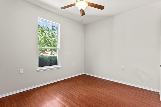 6212 Bumpstead Dr, Austin, TX 78747 - unfurnished room featuring wood finished floors, baseboards, and a ceiling fan