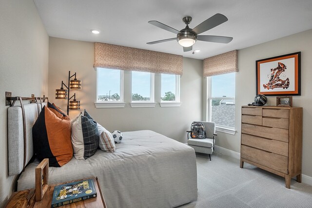 209 Golden Sage Ave, Georgetown, TX 78633 - bedroom with light carpet, baseboards, a ceiling fan, and recessed lighting