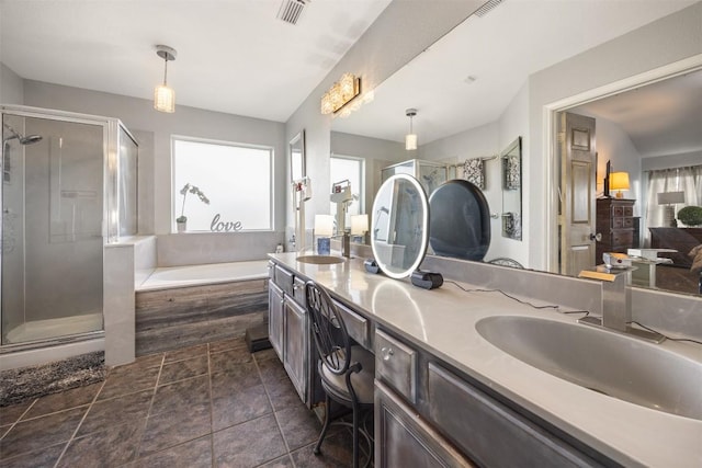 401 Southern Dr, Buda, TX 78610 - full bath featuring a shower stall, a bath, and double vanity