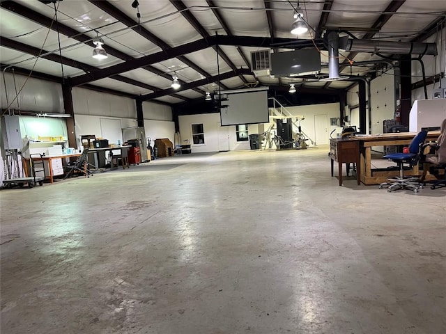 401 Southern Dr, Buda, TX 78610 - garage with a workshop area and electric panel