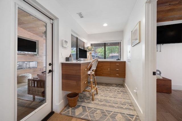 1307 E 2nd St, Austin, TX 78702 - office space with light wood-style flooring, baseboards, and recessed lighting