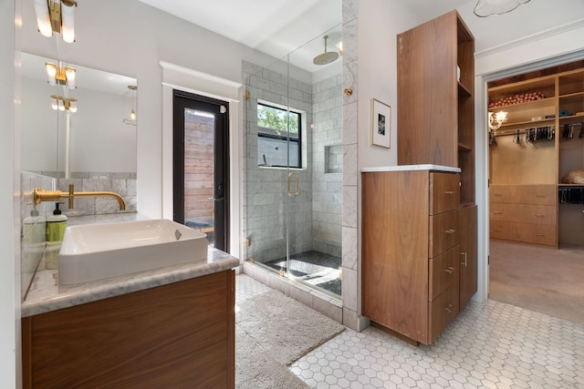 1307 E 2nd St, Austin, TX 78702 - full bath featuring a stall shower, vanity, and a walk in closet
