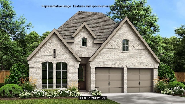 137 Adali Ave, Georgetown, TX 78633 - french country home featuring fence, brick siding, concrete driveway, and roof with shingles