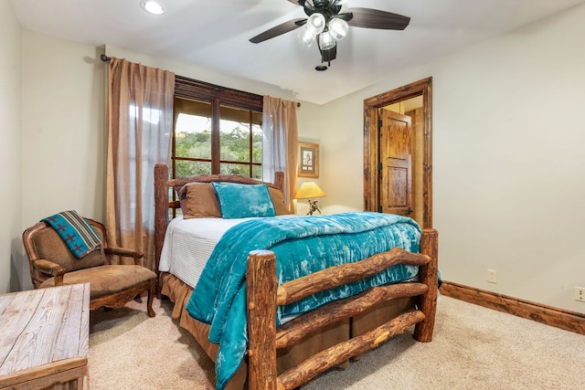 164 Camino Del Reserve, Comfort, TX 78013 - carpeted bedroom featuring baseboards and a ceiling fan