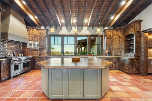 164 Camino Del Reserve, Comfort, TX 78013 - kitchen featuring stainless steel appliances, wooden ceiling, wood counters, wall chimney exhaust hood, and decorative backsplash