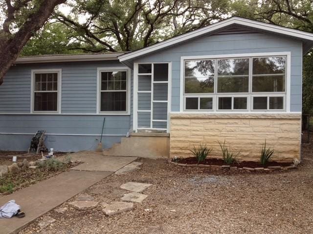 view of front of property with stone siding