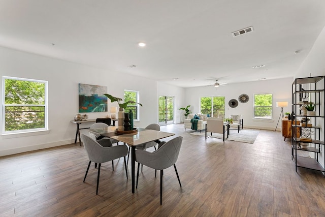 6444 Burnet Rd Unit 204, Austin, TX 78757 - dining room with wood finished floors, ceiling fan, and recessed lighting