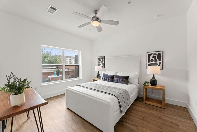 6444 Burnet Rd Unit 204, Austin, TX 78757 - bedroom featuring wood finished floors and ceiling fan