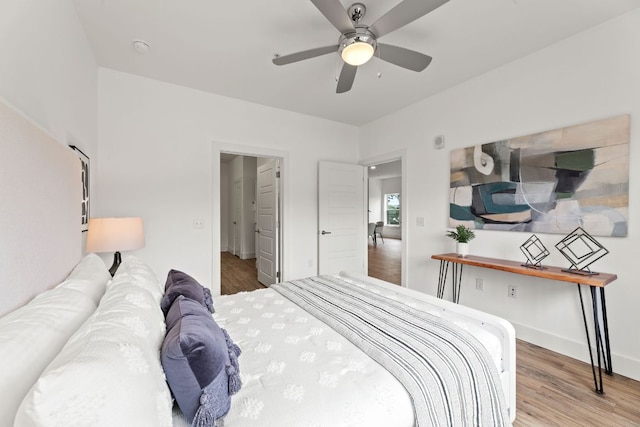 6444 Burnet Rd Unit 204, Austin, TX 78757 - bedroom featuring wood finished floors and ceiling fan