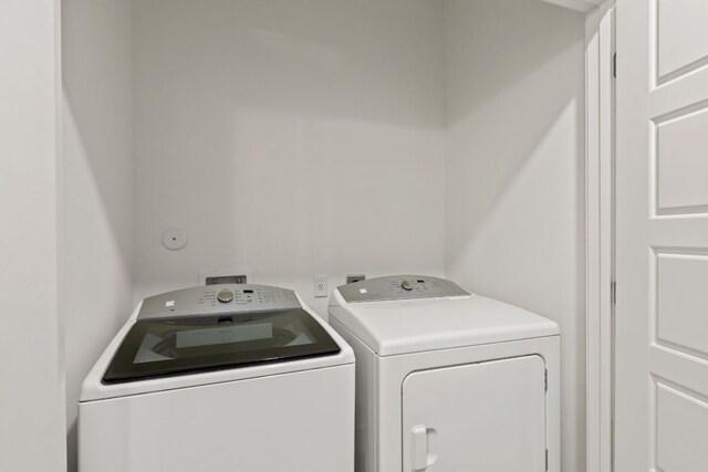 6444 Burnet Rd Unit 204, Austin, TX 78757 - washroom featuring washer and clothes dryer