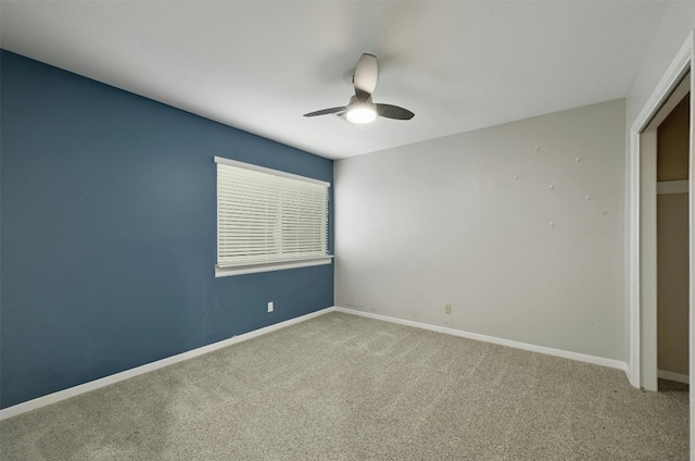 4905 Southcrest Dr, Austin, TX 78746 - unfurnished bedroom with carpet flooring, baseboards, and a ceiling fan