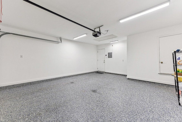 1208 Water Spaniel Way, Round Rock, TX 78664 - garage featuring a garage door opener and baseboards