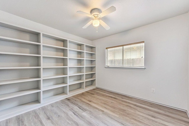 1208 Water Spaniel Way, Round Rock, TX 78664 - spare room featuring wood finished floors and a ceiling fan
