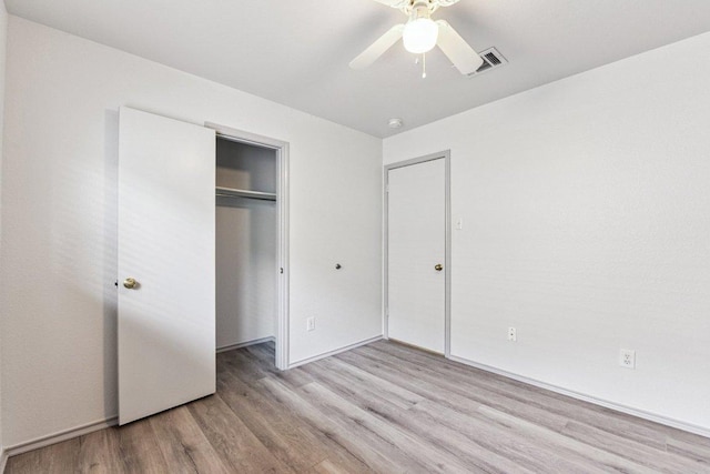 1208 Water Spaniel Way, Round Rock, TX 78664 - unfurnished bedroom featuring light wood finished floors, a closet, a ceiling fan, and baseboards