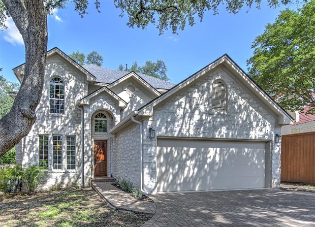 3508 Red River St, Austin, TX 78705 - view of front of house with a garage and decorative driveway