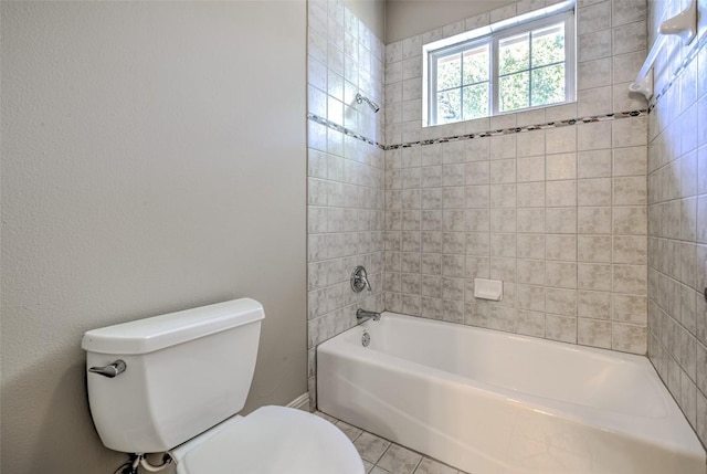 3508 Red River St, Austin, TX 78705 - bathroom with toilet, tub / shower combination, and tile patterned floors