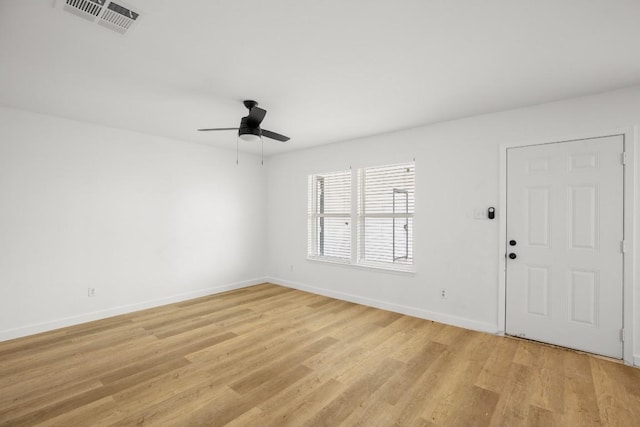 1317 Mckie Cv, Austin, TX 78752 - foyer with light wood-style flooring and ceiling fan