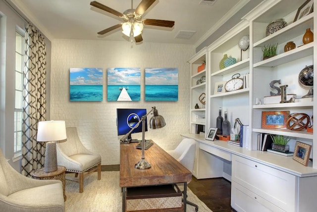 6716 Liberty Grotto Ct, Lago Vista, TX 78645 - office area featuring ceiling fan, dark wood finished floors, and built in desk