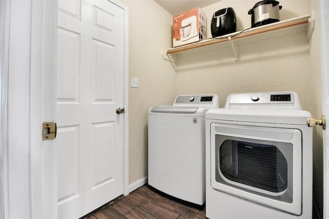 113 Hawkins Ln, Jarrell, TX 76537 - laundry area with separate washer and dryer and dark wood-type flooring