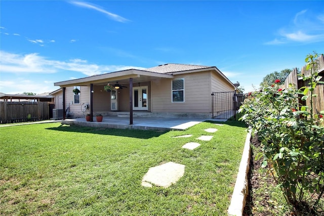 back of house featuring french doors, a patio, a gate, ceiling fan, and central AC