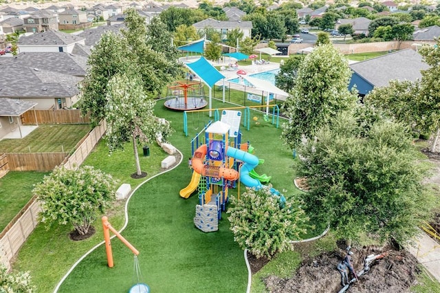 aerial view of residential area featuring a recreational park