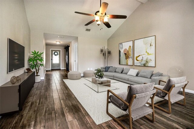 living room featuring high vaulted ceiling, a ceiling fan, baseboards, and dark wood-style flooring