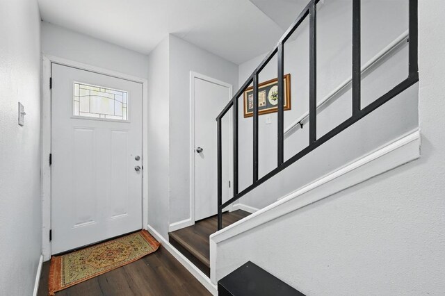 3820 Southway Dr Unit C, Austin, TX 78704 - foyer entrance featuring wood finished floors, stairs, and baseboards