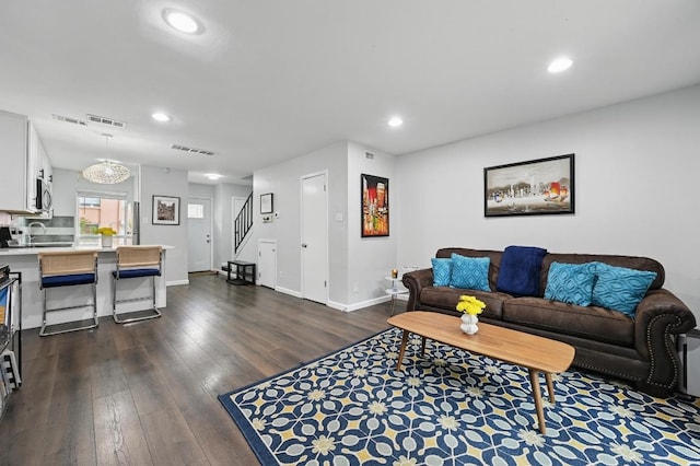 3820 Southway Dr Unit C, Austin, TX 78704 - living area featuring dark wood-style flooring, stairway, recessed lighting, and baseboards