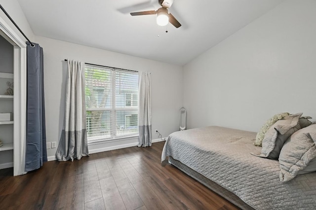 3820 Southway Dr Unit C, Austin, TX 78704 - bedroom with dark wood finished floors, vaulted ceiling, a ceiling fan, and baseboards