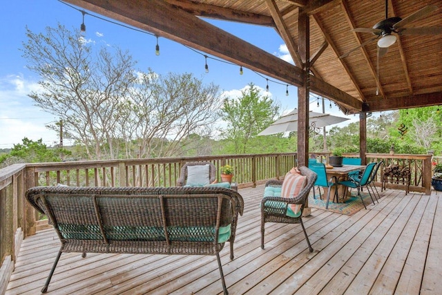 6906 Chinook Dr, Austin, TX 78736 - wooden deck featuring a ceiling fan, outdoor dining space, and an outdoor living space