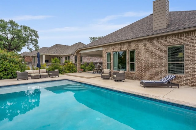 10515 Bryson Dr, Temple, TX 76502 - swimming pool featuring an outdoor hangout area and a patio area