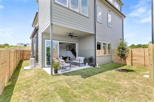 6308 Bristol Cir Unit A, Austin, TX 78723 - back of house with a ceiling fan, a patio area, and an outdoor hangout area