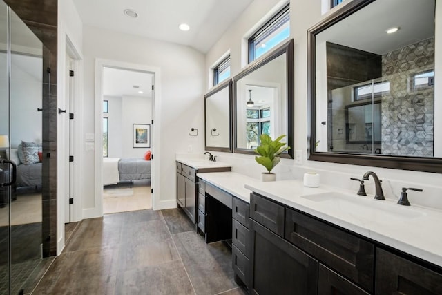 full bath with ensuite bathroom, a stall shower, vanity, and recessed lighting