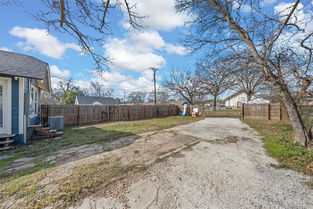 3225 Homan Ave, Waco, TX 76707 - fenced backyard featuring cooling unit and entry steps