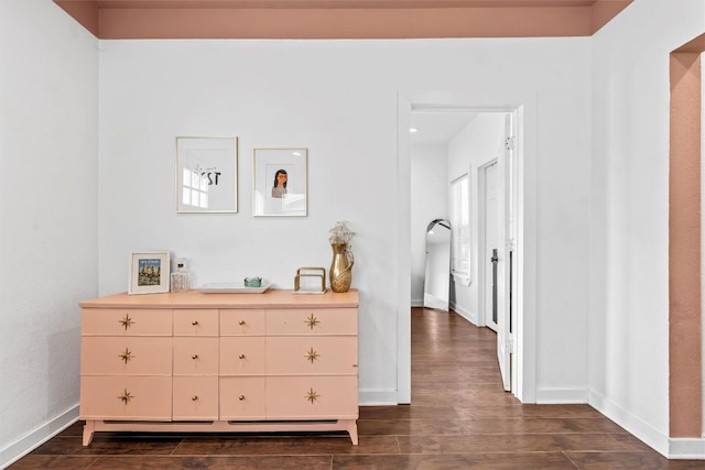 3225 Homan Ave, Waco, TX 76707 - corridor featuring dark wood-style flooring and baseboards
