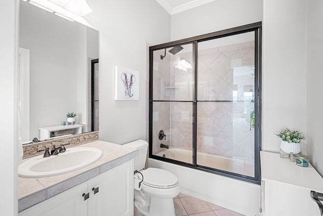 4020 Texas Wildlife Trl, Austin, TX 78735 - full bathroom with crown molding, vanity, shower / bath combination with glass door, tile patterned flooring, and toilet