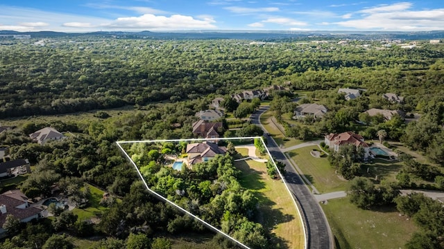 4020 Texas Wildlife Trl, Austin, TX 78735 - aerial view of property and surrounding area with property boundaries highlighted and a forest