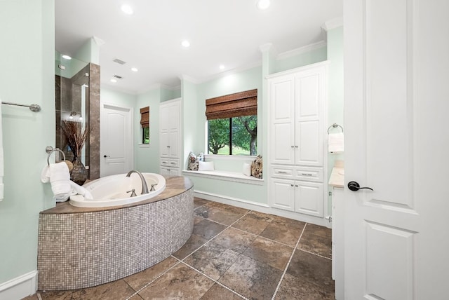 4020 Texas Wildlife Trl, Austin, TX 78735 - bathroom with a bath, crown molding, stone tile floors, and recessed lighting
