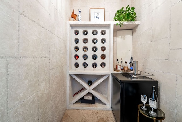 4020 Texas Wildlife Trl, Austin, TX 78735 - wine area featuring concrete block wall and tile patterned flooring