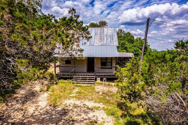990 Oak Mdws, San Marcos, TX 78666 - view of front of property featuring covered porch and metal roof