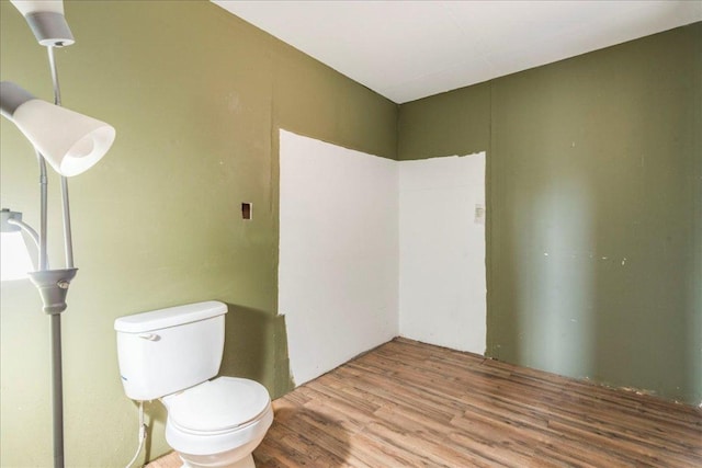 990 Oak Mdws, San Marcos, TX 78666 - bathroom featuring wood finished floors and toilet