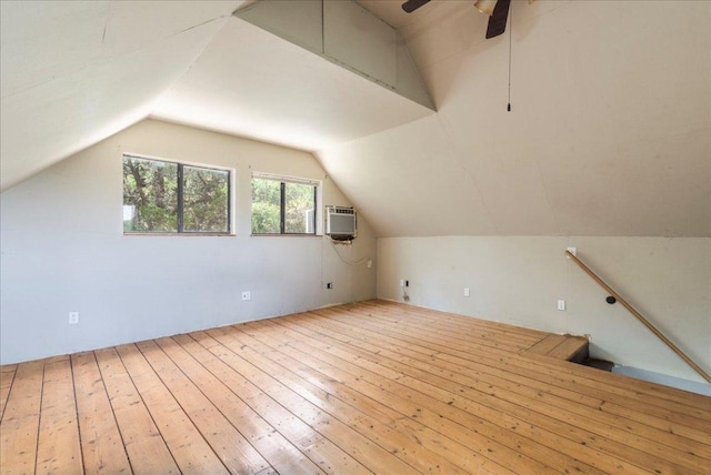 990 Oak Mdws, San Marcos, TX 78666 - additional living space with lofted ceiling, wood-type flooring, a wall unit AC, and ceiling fan