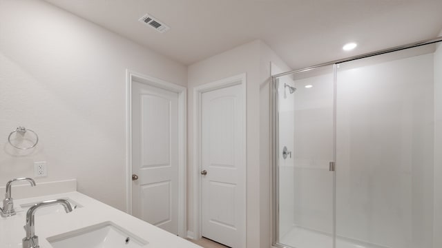 329 Lone Cedar Rd, Marble Falls, TX 78654 - full bath with a shower stall, a sink, and recessed lighting