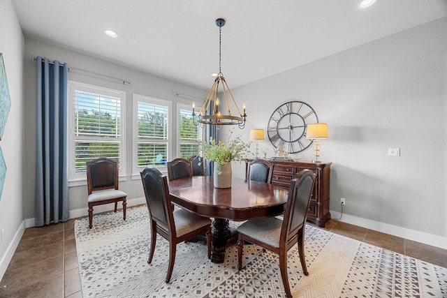 128 Tuscany Way, Georgetown, TX 78633 - tiled dining space with a chandelier, baseboards, and recessed lighting