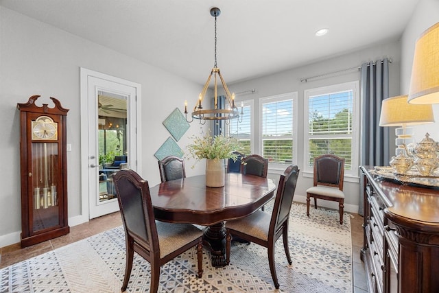 128 Tuscany Way, Georgetown, TX 78633 - dining room featuring a chandelier, baseboards, light tile patterned floors, and recessed lighting