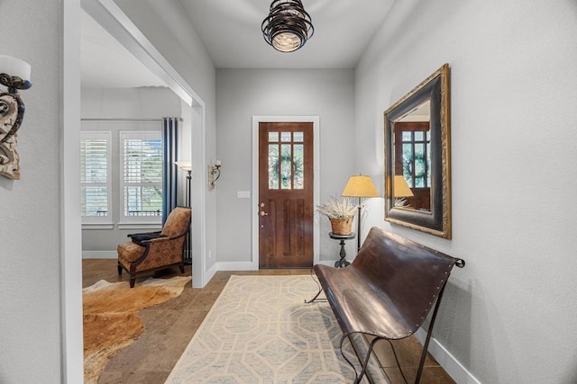 128 Tuscany Way, Georgetown, TX 78633 - foyer entrance featuring healthy amount of natural light and baseboards