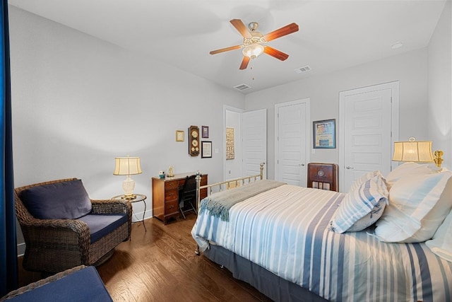 128 Tuscany Way, Georgetown, TX 78633 - bedroom with wood finished floors, baseboards, and ceiling fan