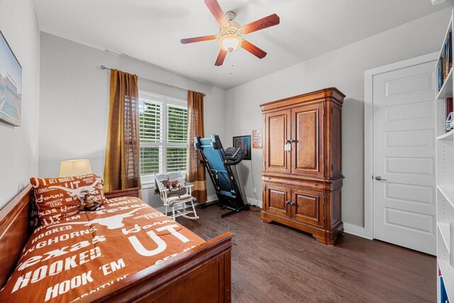 128 Tuscany Way, Georgetown, TX 78633 - bedroom with dark wood-type flooring and ceiling fan