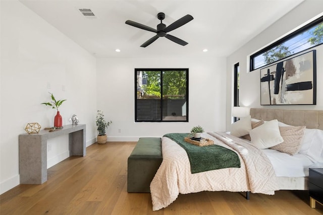 3705 Wilson St Unit 1, Austin, TX 78704 - bedroom with recessed lighting, wood finished floors, and ceiling fan