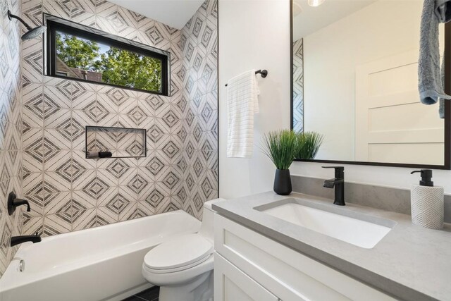 3705 Wilson St Unit 1, Austin, TX 78704 - bathroom featuring vanity and washtub / shower combination